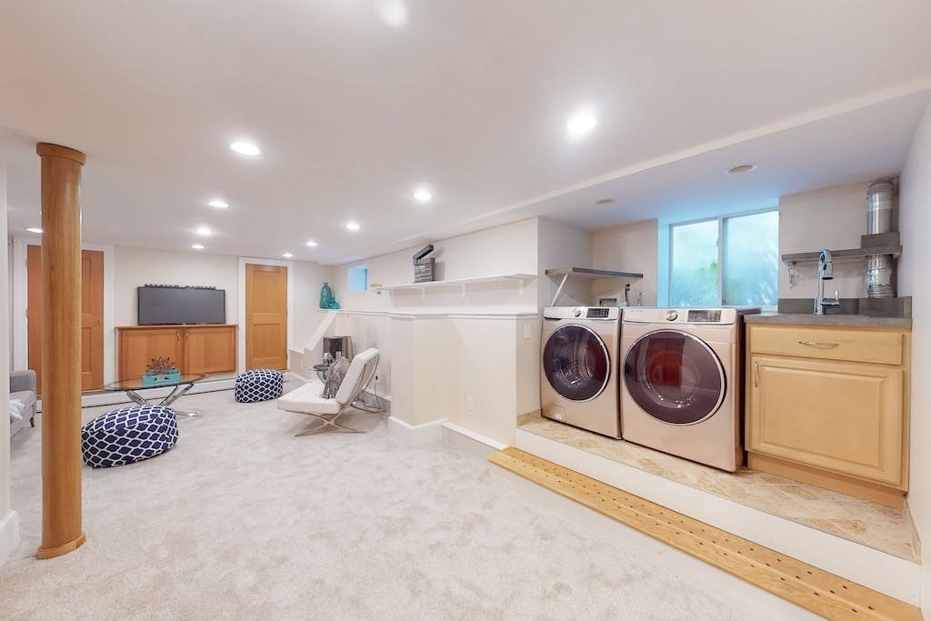 27 Inman Street Cambridge, MA 02139 - Photo 24 of 32 a storage room with washer and dryer