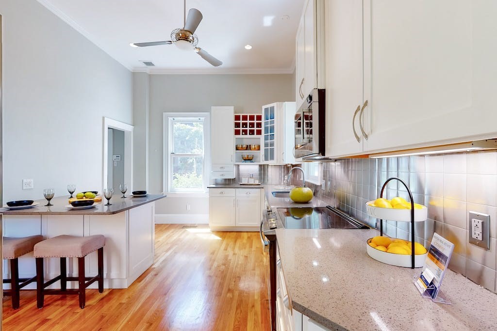 27 Inman Street Cambridge, MA 02139 - Photo 8 of 32 a view of a dining room with furniture and a wooden floor