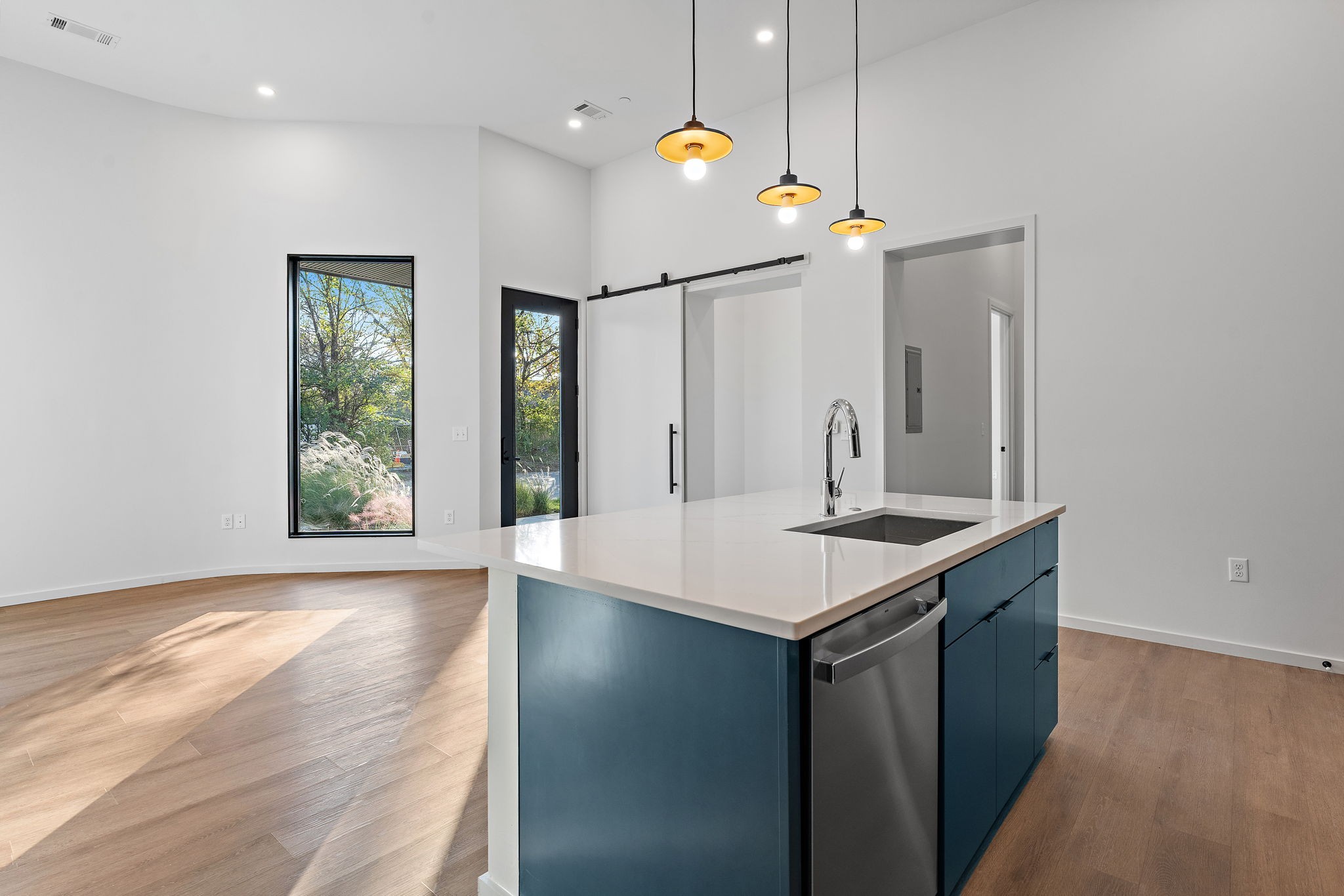 504 Merritt Avenue Nashville, TN 37203 - Photo 12 of 23 a kitchen that has a sink and a wooden floor
