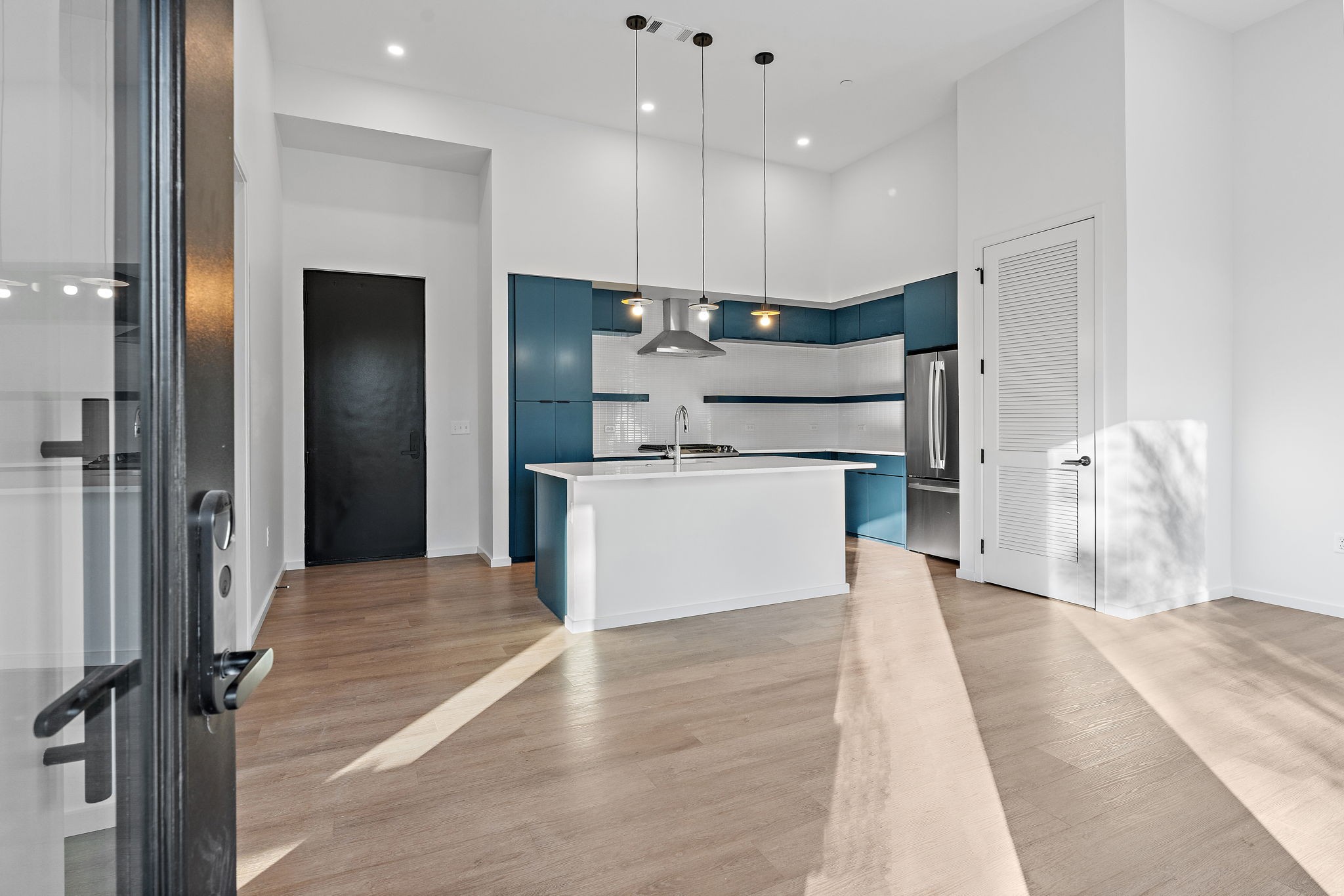 504 Merritt Avenue Nashville, TN 37203 - Photo 6 of 23 a kitchen with stainless steel appliances kitchen island granite countertop a refrigerator and a sink