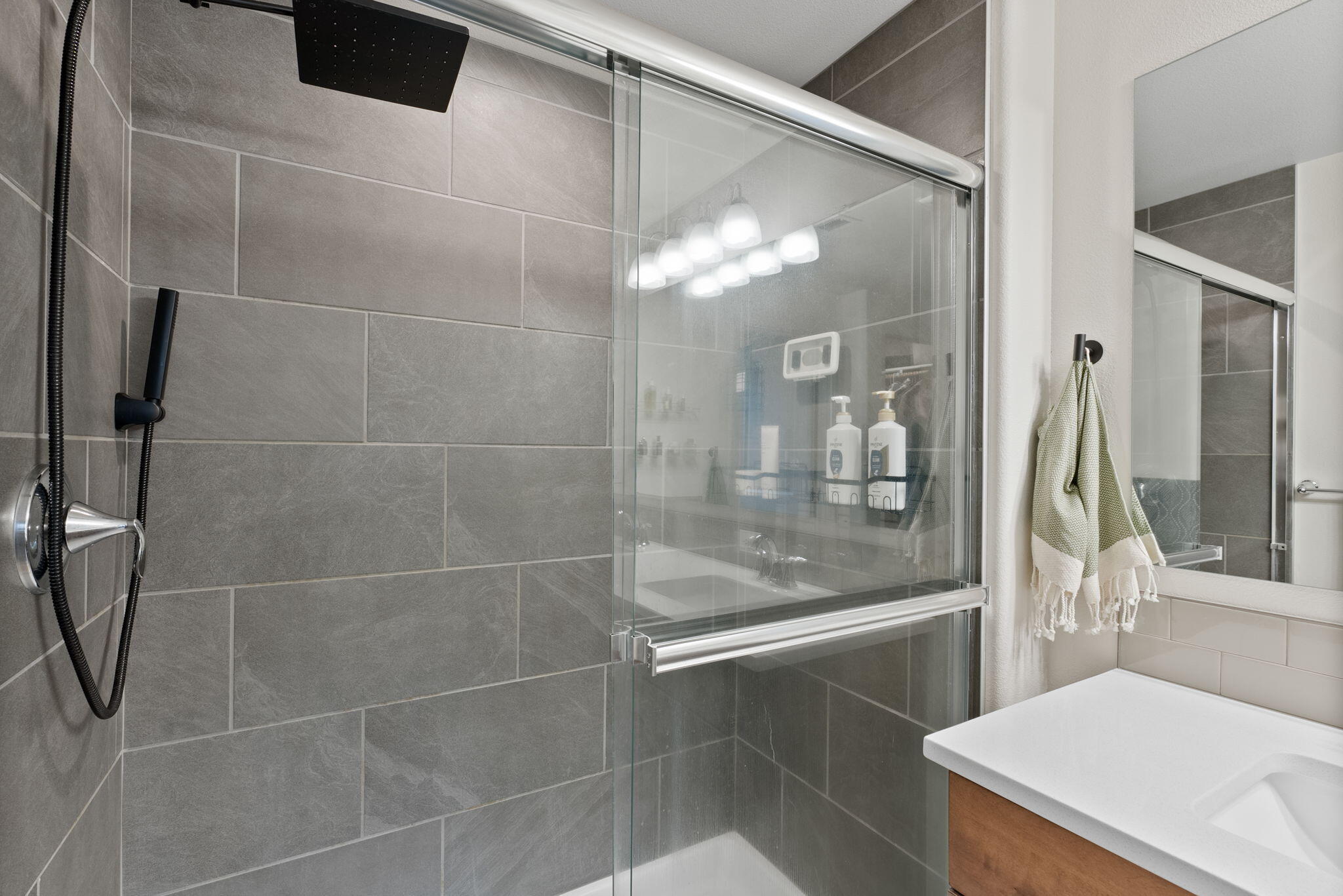 632 North Reed Street Sisters, OR 97759 - Photo 16 of 36 a bathroom with a bathtub and a shower
