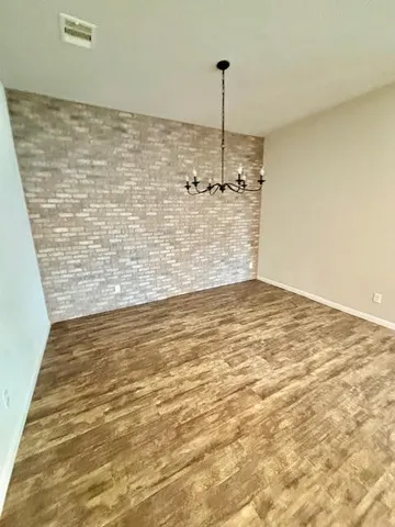 a bathroom with a sink vanity and a mirror