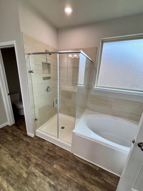 14381 Whitetop Peak Court Conroe, TX 77384 - Photo 14 of 39 a bathroom with a bathtub