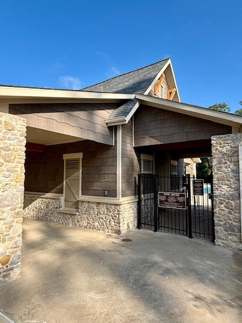 14381 Whitetop Peak Court Conroe, TX 77384 - Photo 33 of 39 a front view of a house with yard and garage