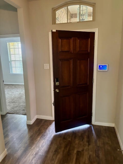 14381 Whitetop Peak Court Conroe, TX 77384 - Photo 6 of 39 a view of a hallway with wooden floor