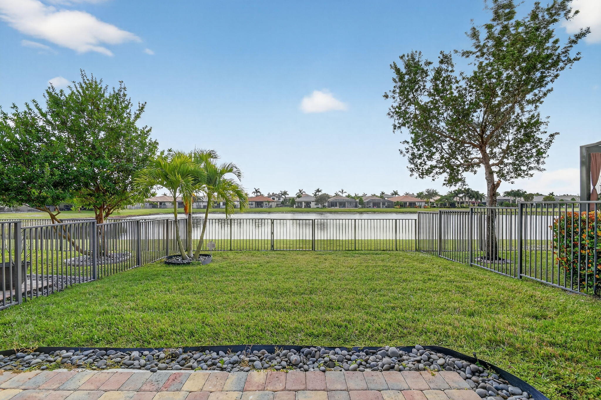 8301 Rearing Lane Wellington, FL 33467 - Photo 24 of 53 Back View from Patio