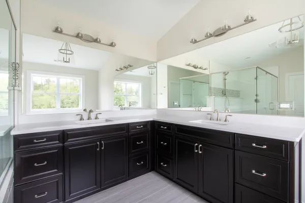 a kitchen with a sink and cabinets