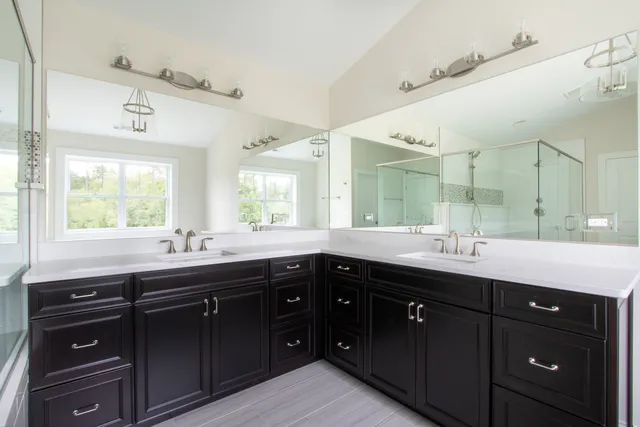 a kitchen with a sink and cabinets