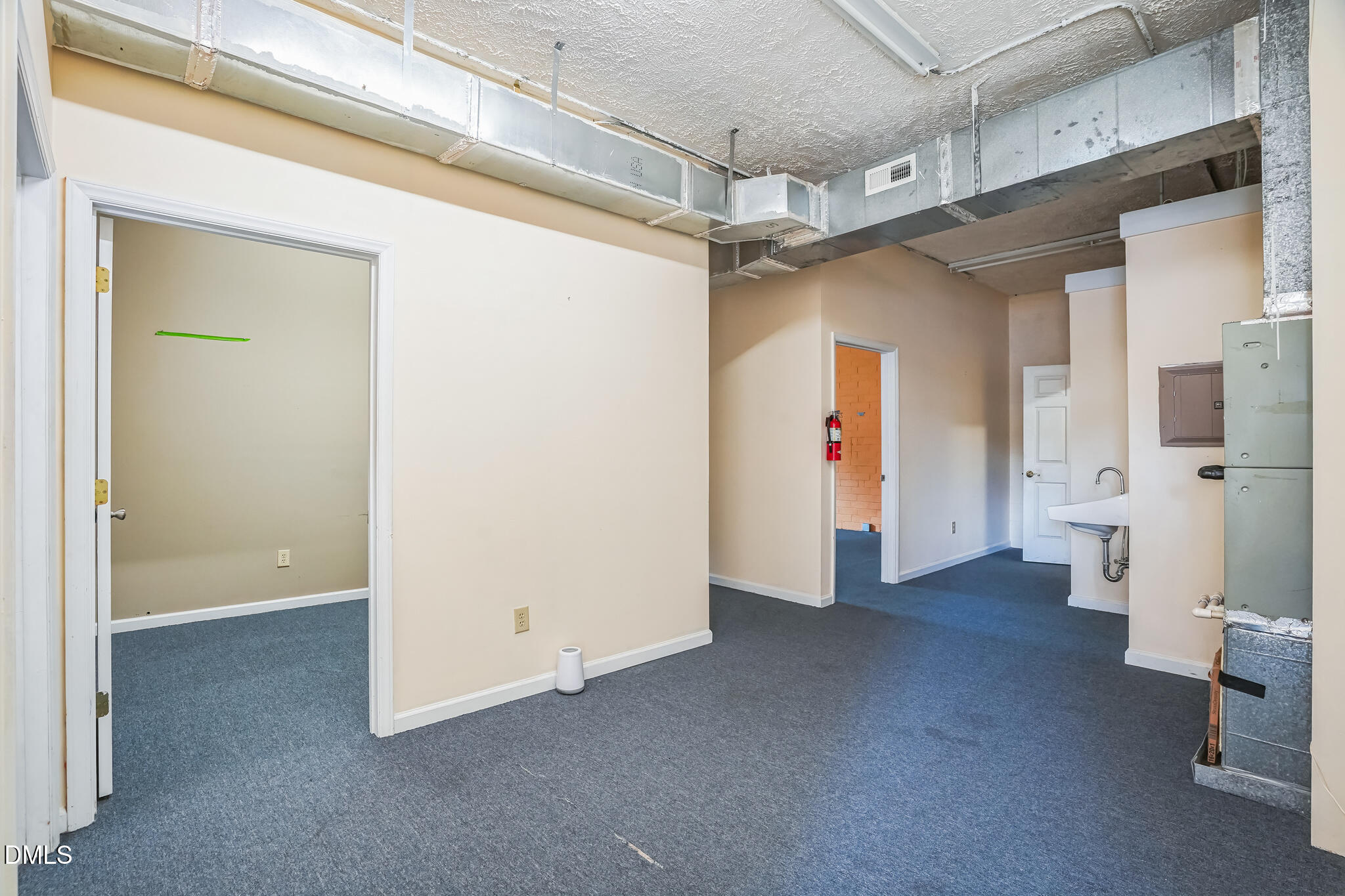 225 South Madison Boulevard Roxboro, NC 27573 - Photo 11 of 19 a view of a hallway with bathroom and a shower