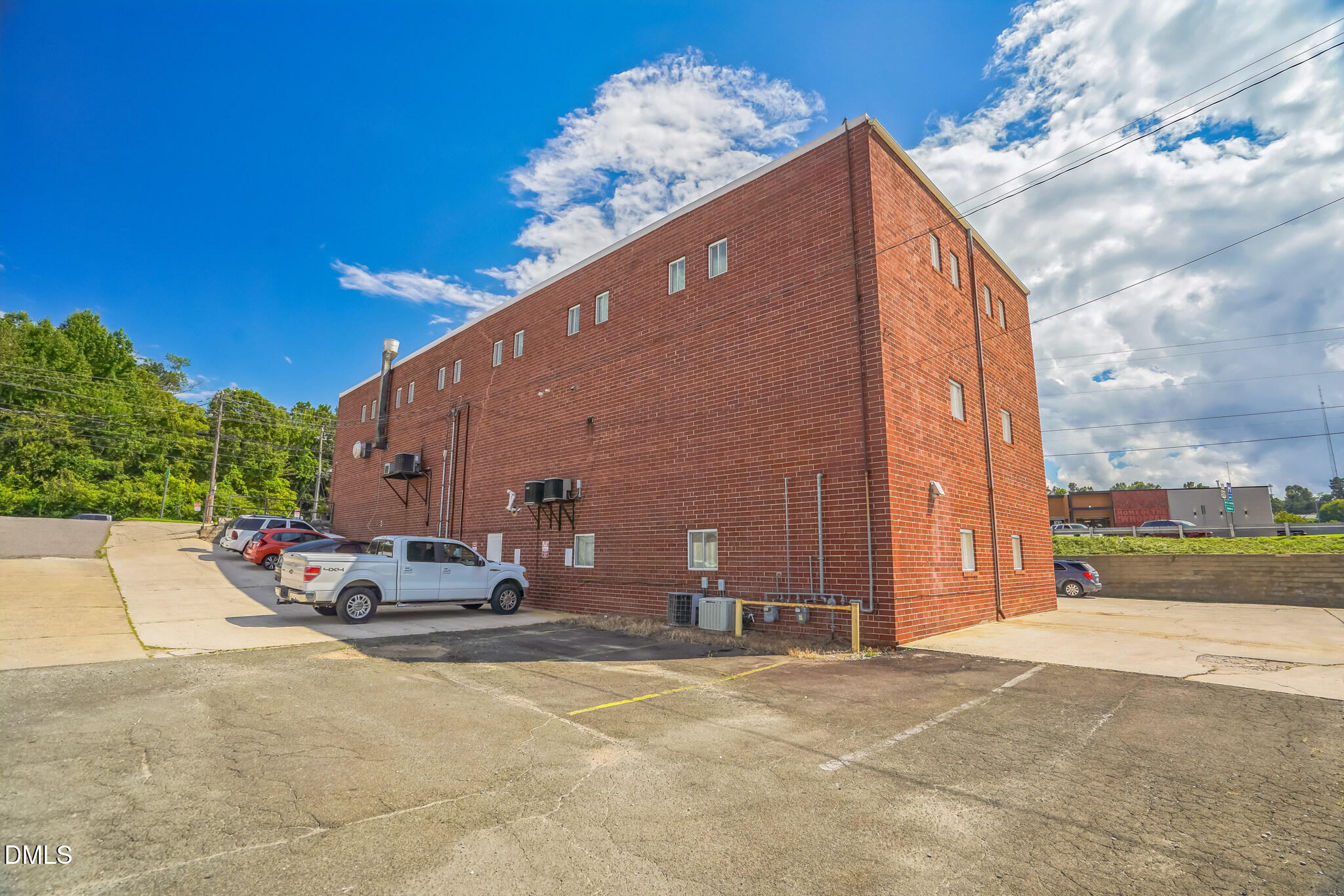 225 South Madison Boulevard Roxboro, NC 27573 - Photo 12 of 19 a backyard of a house with table and chairs