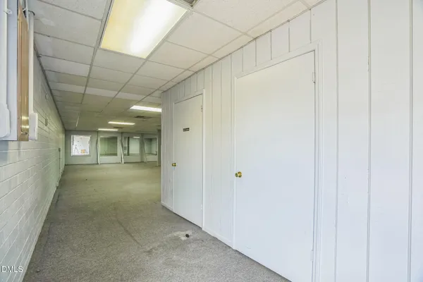 a view of hallway with livingroom