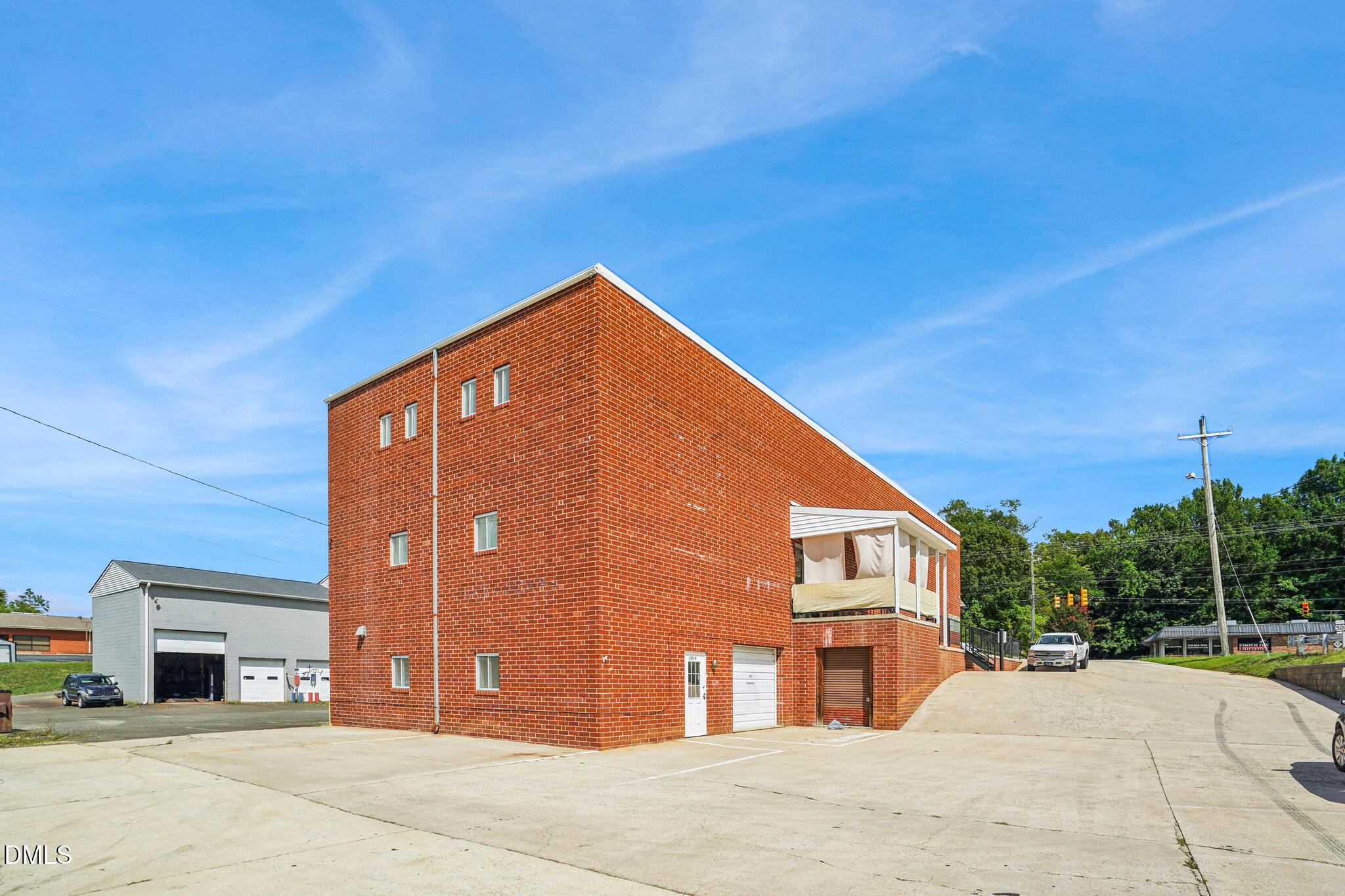 225 South Madison Boulevard Roxboro, NC 27573 - Photo 15 of 19 a view of a house with a street