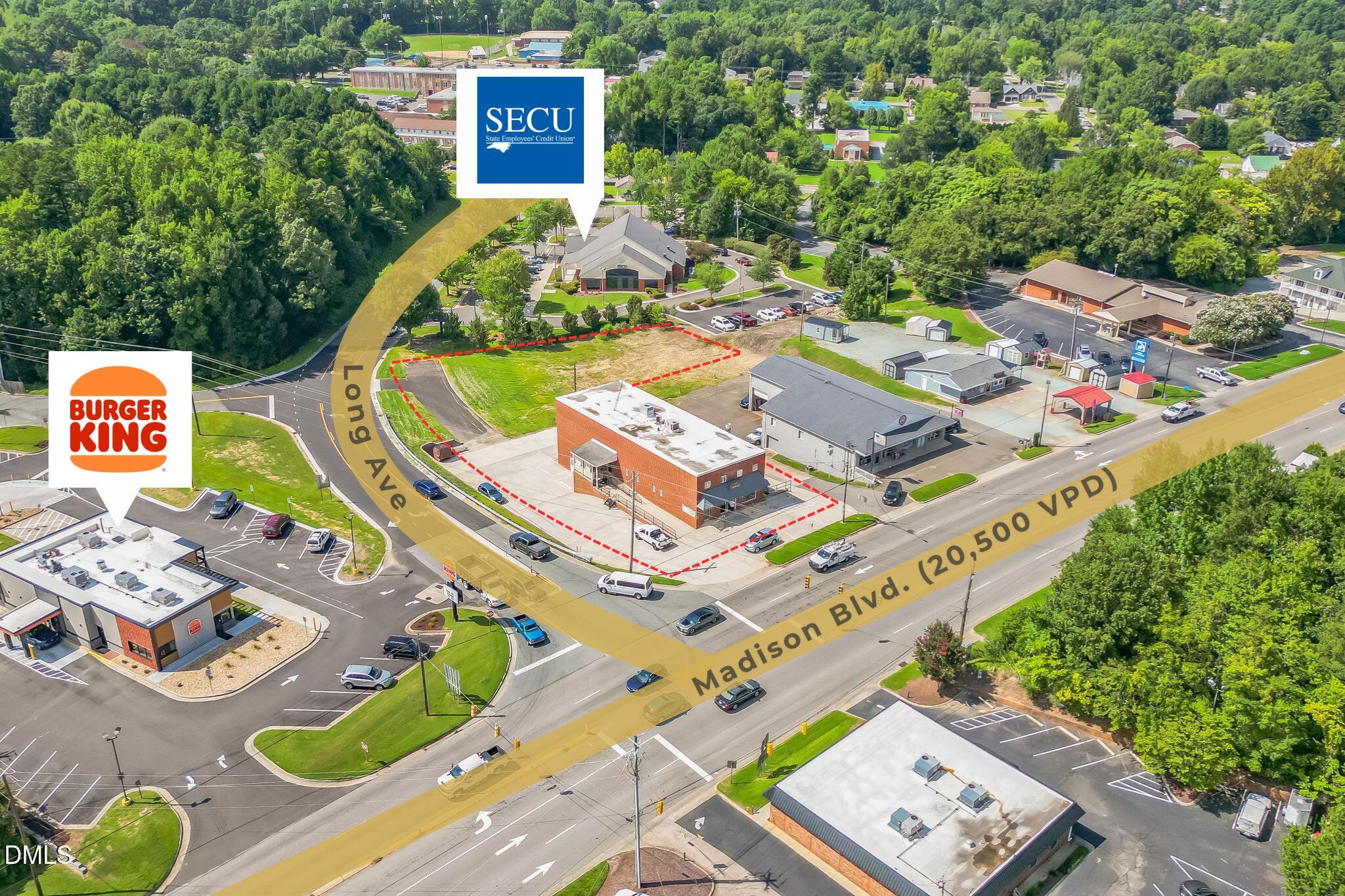 225 South Madison Boulevard Roxboro, NC 27573 - Photo 2 of 19 a view of a table and chairs in a backyard
