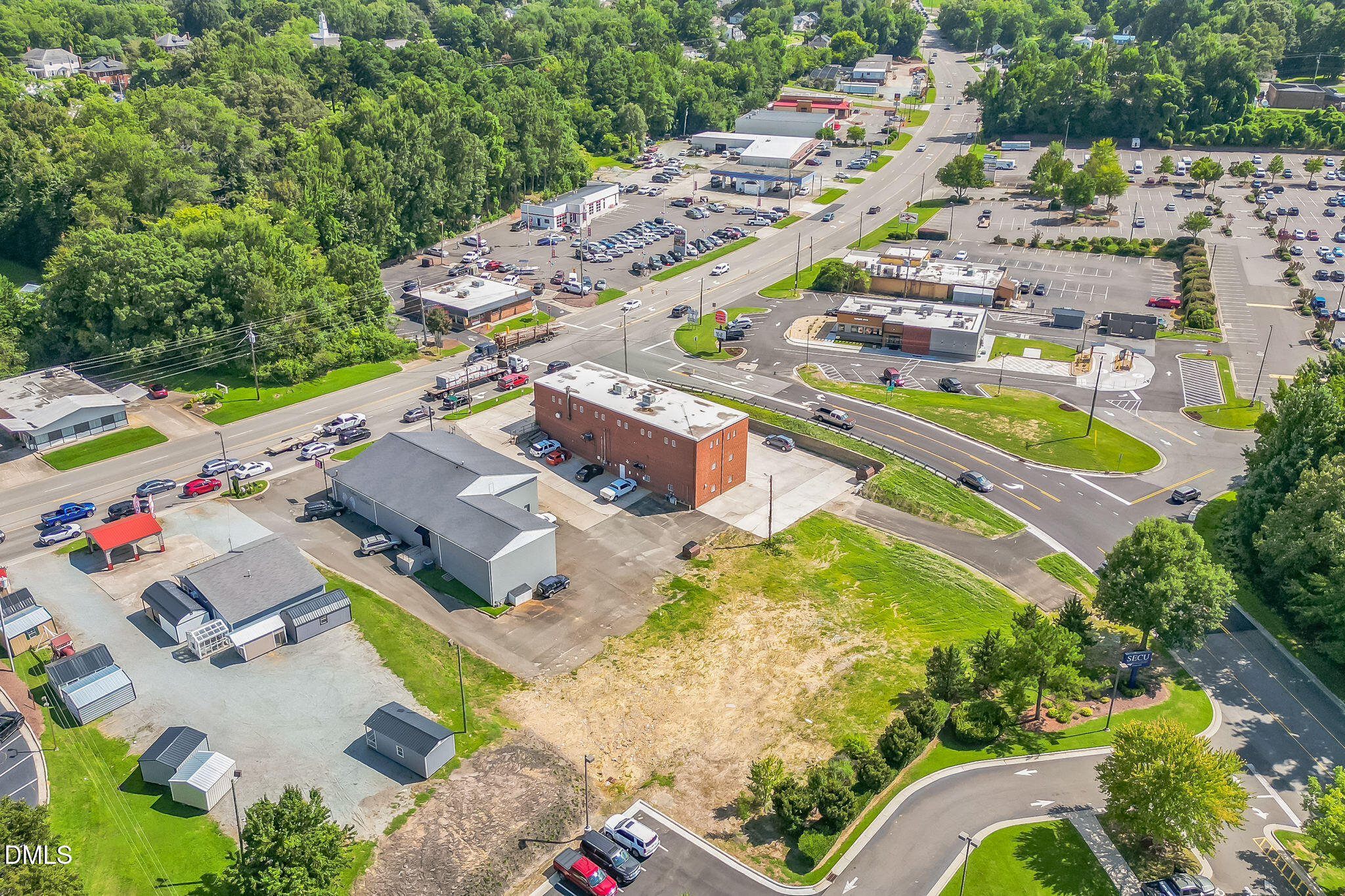 225 South Madison Boulevard Roxboro, NC 27573 - Photo 3 of 19 a aerial view of a city