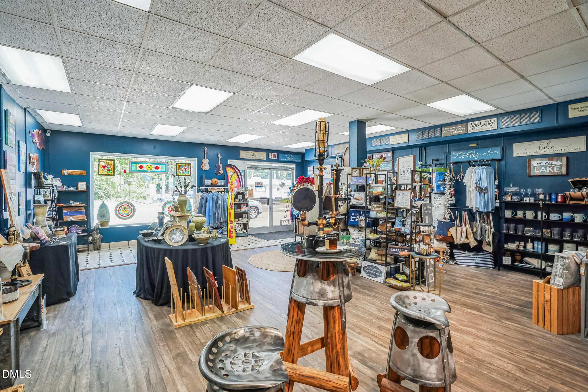 225 South Madison Boulevard Roxboro, NC 27573 - Photo 8 of 19 a view of a dining room with lots of furniture and wooden floor