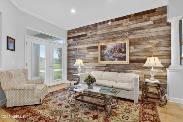a living room with furniture and a rug
