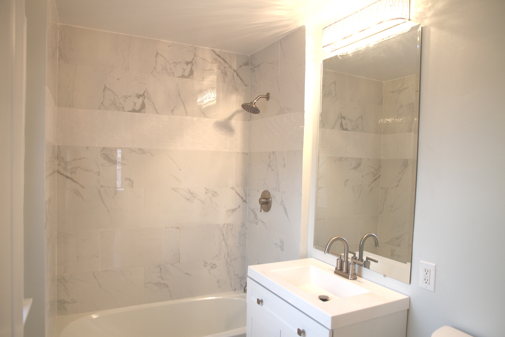 10132 South Green Street Chicago, IL 60643 - Photo 26 of 26 a bathroom with a sink mirror shower and a bathtub