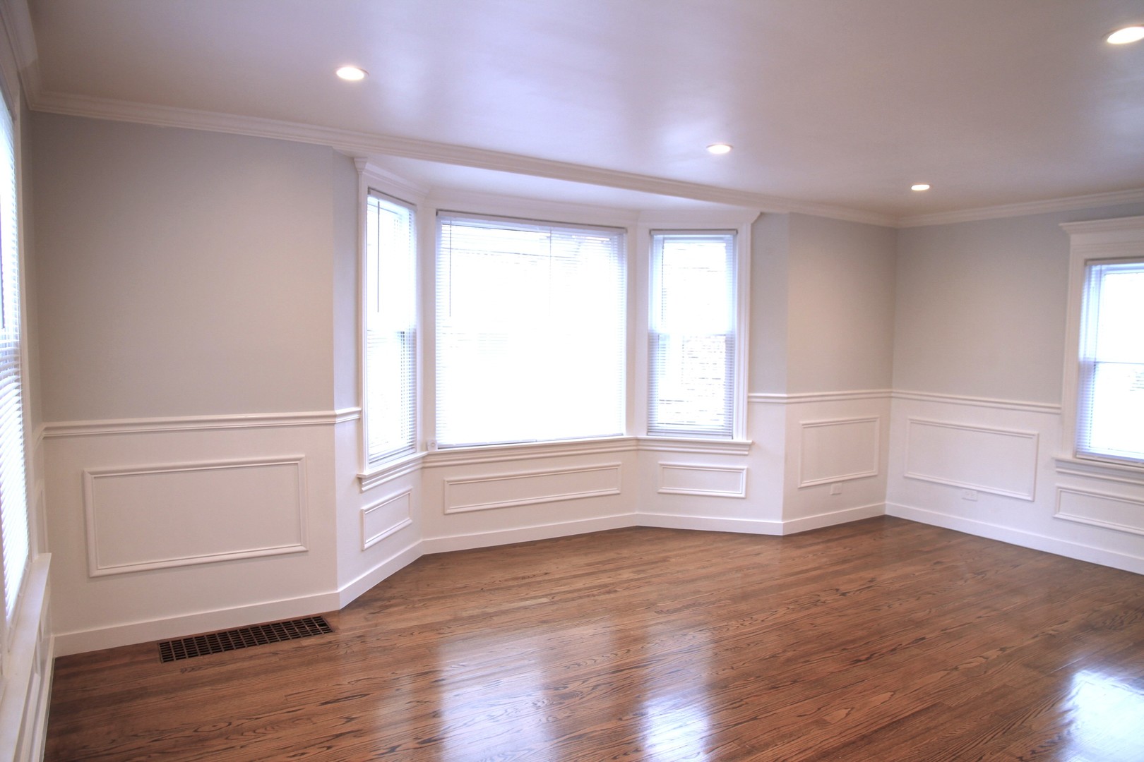 10132 South Green Street Chicago, IL 60643 - Photo 3 of 26 wooden floor in an empty room with a window
