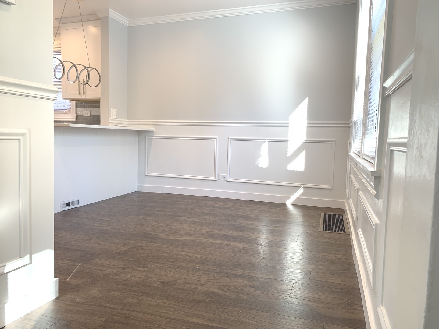 10132 South Green Street Chicago, IL 60643 - Photo 8 of 26 a view of empty room with wooden floor and fan