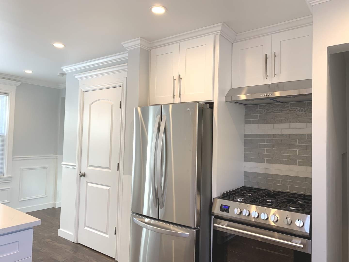 10132 South Green Street Chicago, IL 60643 - Photo 10 of 26 a kitchen with granite countertop a refrigerator and a stove top oven