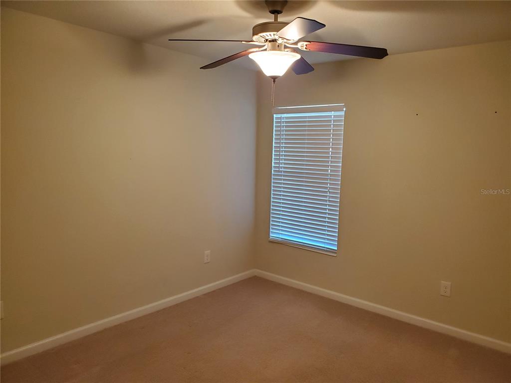 4079 Southwest 47th Court Ocala, FL 34474 - Photo 12 of 31 a view of an empty room with a window
