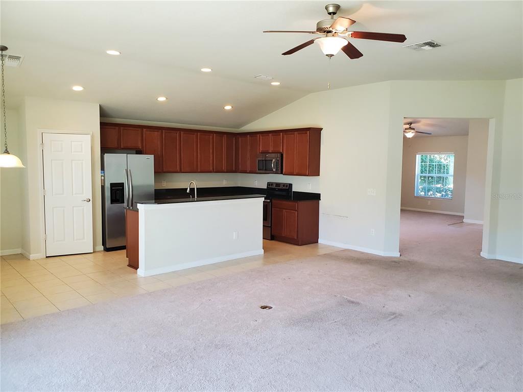 4079 Southwest 47th Court Ocala, FL 34474 - Photo 3 of 31 a view of kitchen with stainless steel appliances cabinets