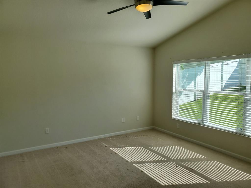 4079 Southwest 47th Court Ocala, FL 34474 - Photo 6 of 31 an empty room with a window
