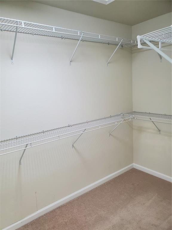 4079 Southwest 47th Court Ocala, FL 34474 - Photo 8 of 31 a view of an empty walk in closet