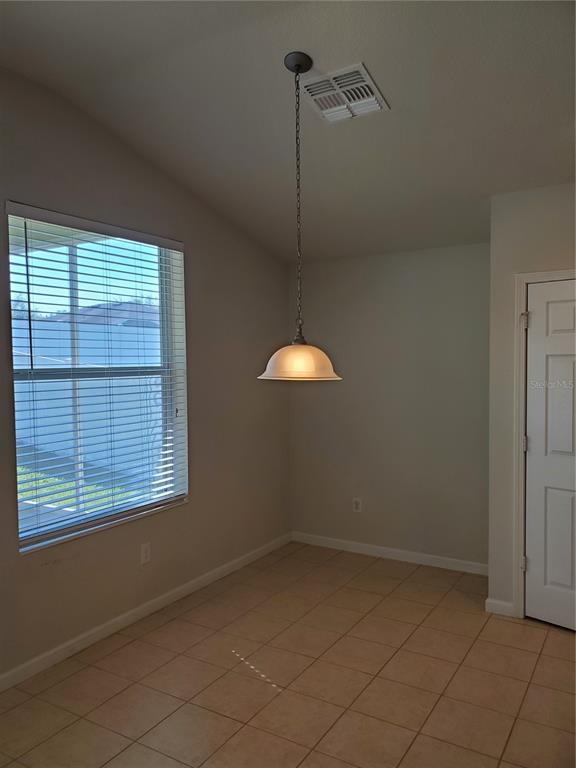 4079 Southwest 47th Court Ocala, FL 34474 - Photo 10 of 31 an empty room with a window