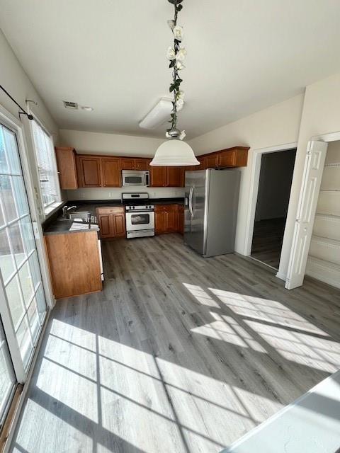 915 Wendlebury Court Alpharetta, GA 30004 - Photo 12 of 27 a living room with furniture and a flat screen tv