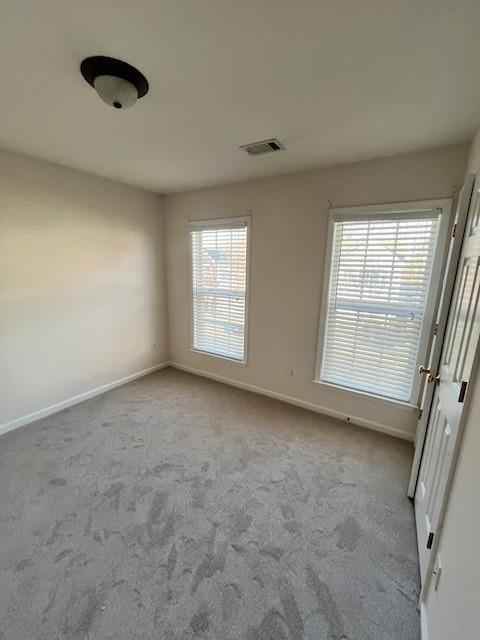 915 Wendlebury Court Alpharetta, GA 30004 - Photo 21 of 27 an empty room with windows