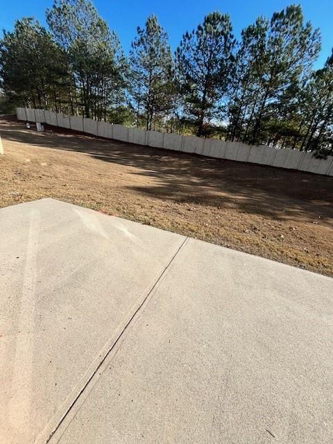 915 Wendlebury Court Alpharetta, GA 30004 - Photo 26 of 27 a view of a swimming pool with a yard
