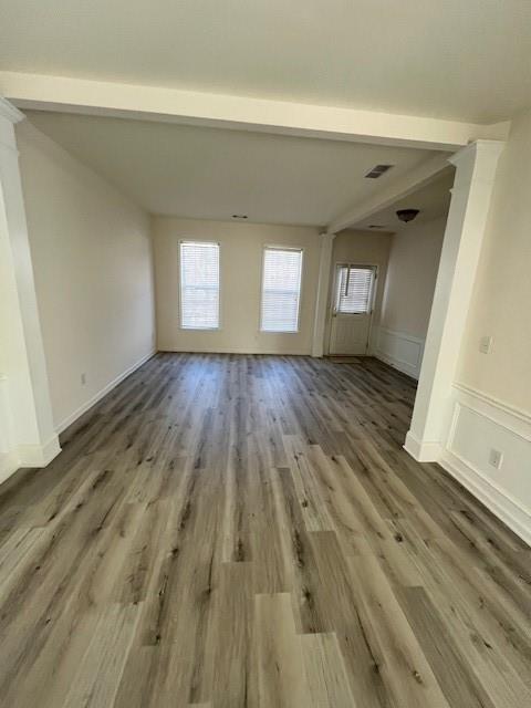 915 Wendlebury Court Alpharetta, GA 30004 - Photo 9 of 27 a view of empty room with wooden floor and fan