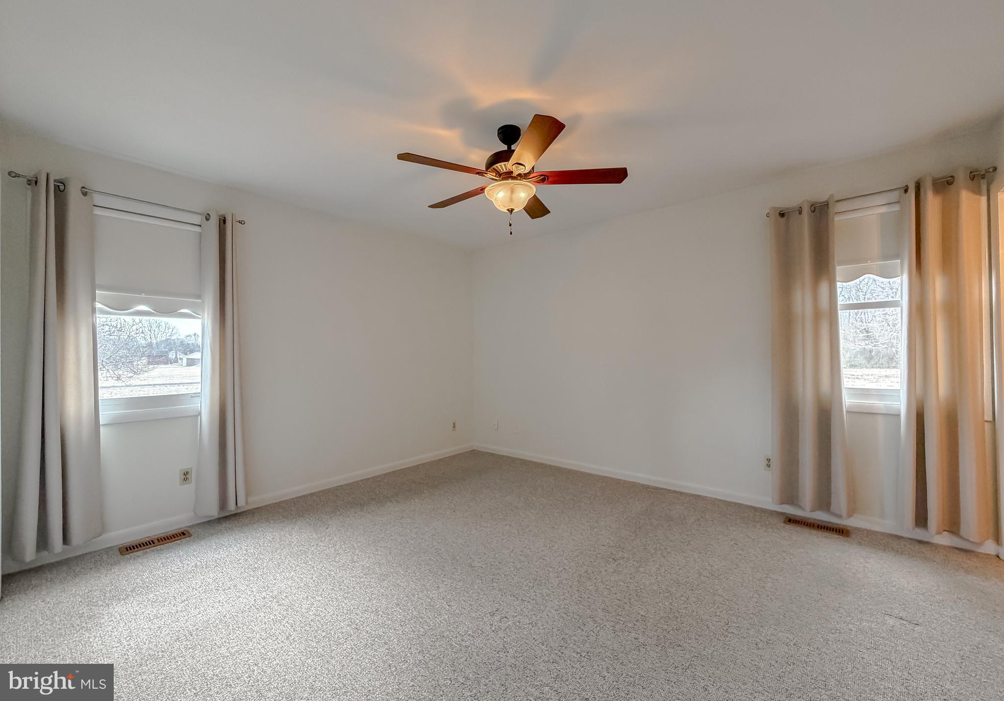 7615 Mill Creek Road Benedict, MD 20612 - Photo 15 of 37 a view of an empty room with a window