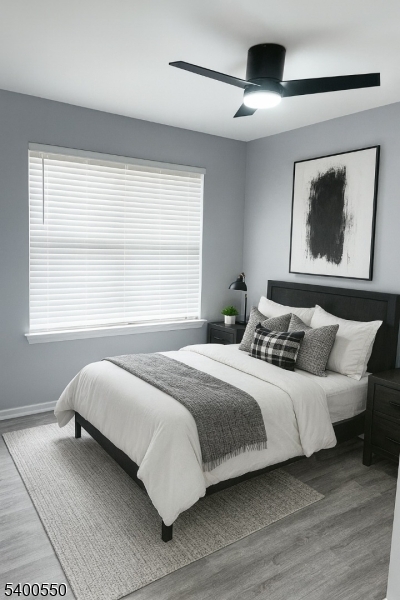 68 Marrow Street Newark, NJ 07103 - Photo 12 of 17 a bedroom with a large bed and a window