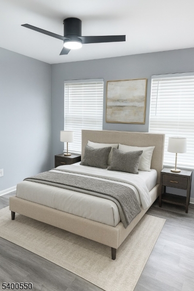 68 Marrow Street Newark, NJ 07103 - Photo 14 of 17 a bedroom with a bed and a chandelier