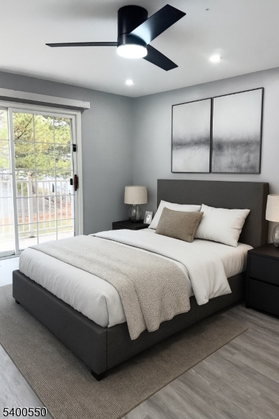 68 Marrow Street Newark, NJ 07103 - Photo 8 of 17 a bedroom with a large bed and a large window