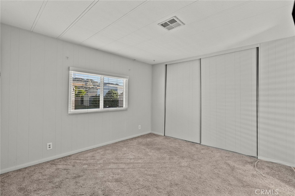 6480 Katherine, Unit 75 Simi Valley, CA 93063 - Photo 11 of 30 a view of an empty room with a window