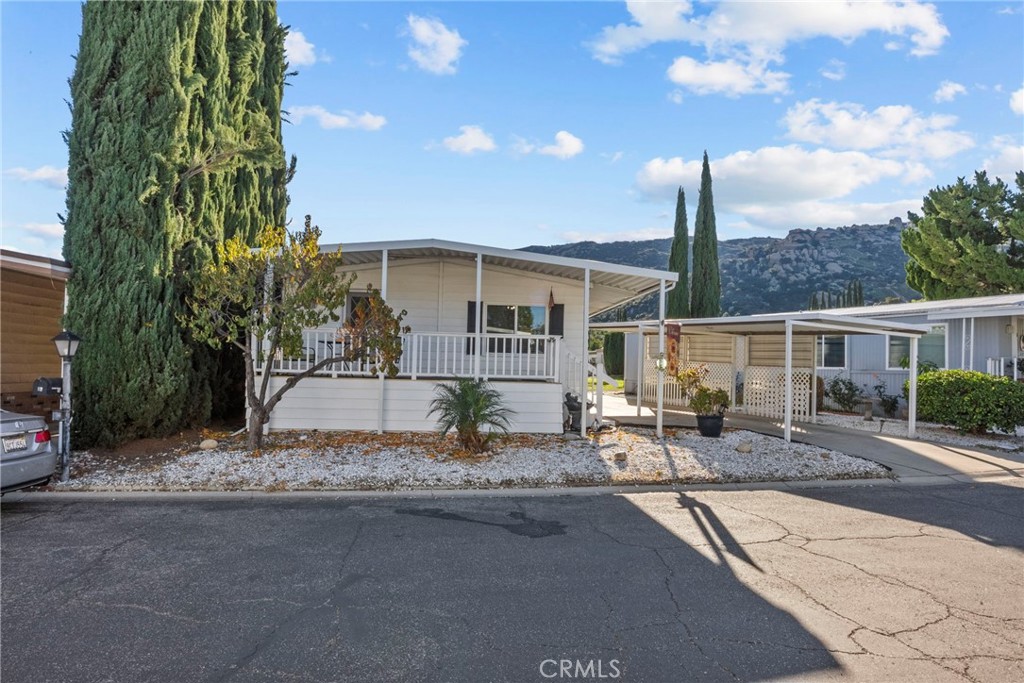 6480 Katherine, Unit 75 Simi Valley, CA 93063 - Photo 30 of 30 a front view of a house with garden