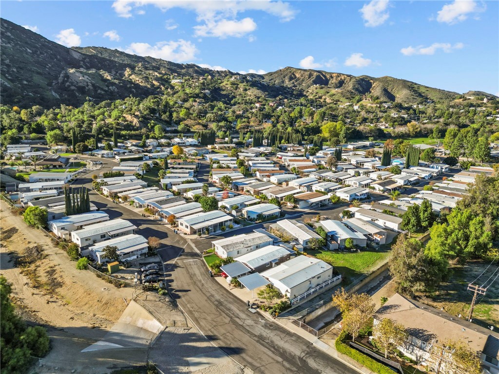 6480 Katherine, Unit 75 Simi Valley, CA 93063 - Photo 3 of 30 an aerial view of residential houses with outdoor space