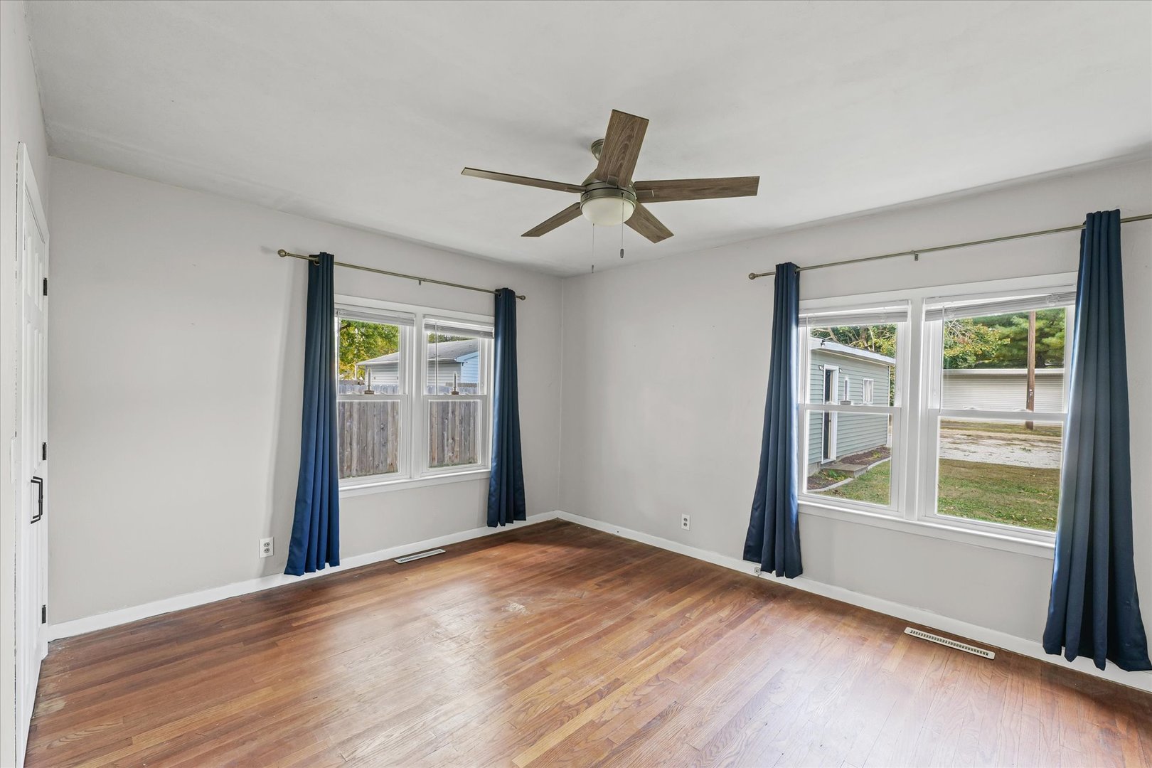 601 West Main Street Clinton, IL 61727 - Photo 19 of 33 a view of an empty room with a window