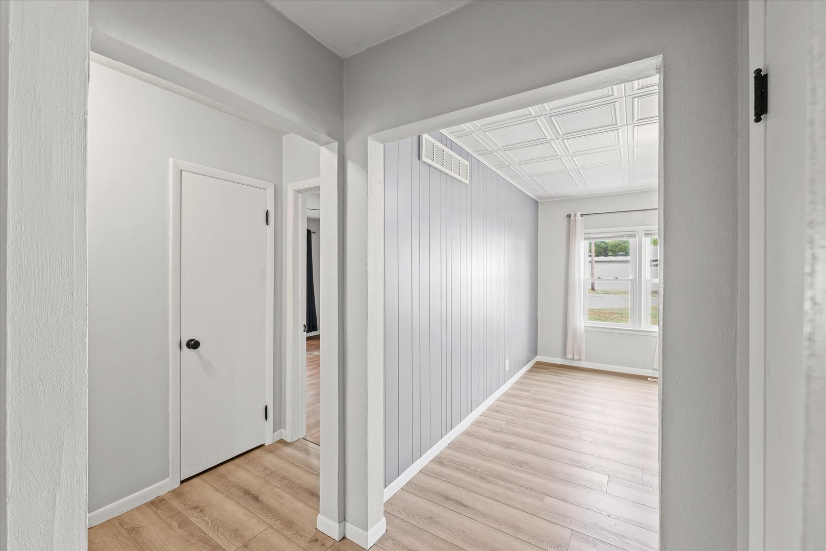 601 West Main Street Clinton, IL 61727 - Photo 10 of 33 a view of a hallway with wooden floor