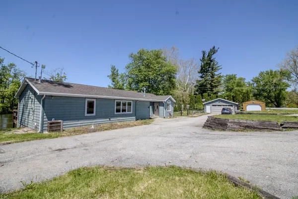 a house with trees in front of it