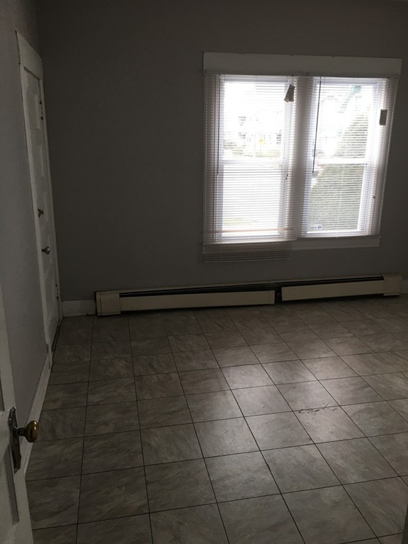 529 White Street Springfield, MA 01108 - Photo 14 of 16 a view of a utility room with a window