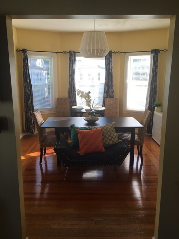529 White Street Springfield, MA 01108 - Photo 2 of 16 a view of a dining room with furniture and window