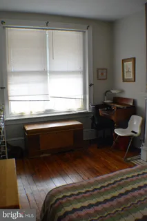 a workspace with furniture and window