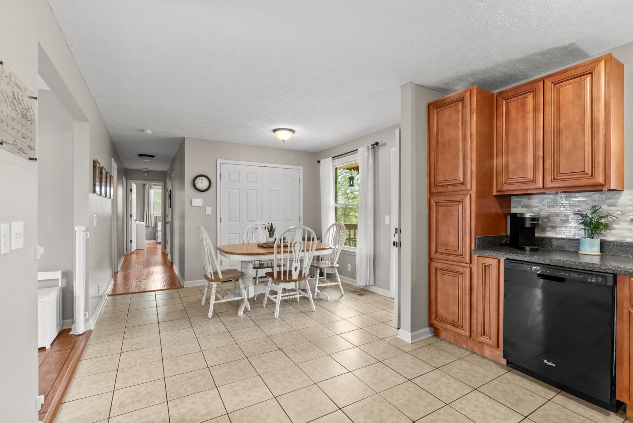 4005 Fawn Drive Springfield, TN 37172 - Photo 11 of 40 a kitchen with stainless steel appliances a dining table chairs and granite counter tops