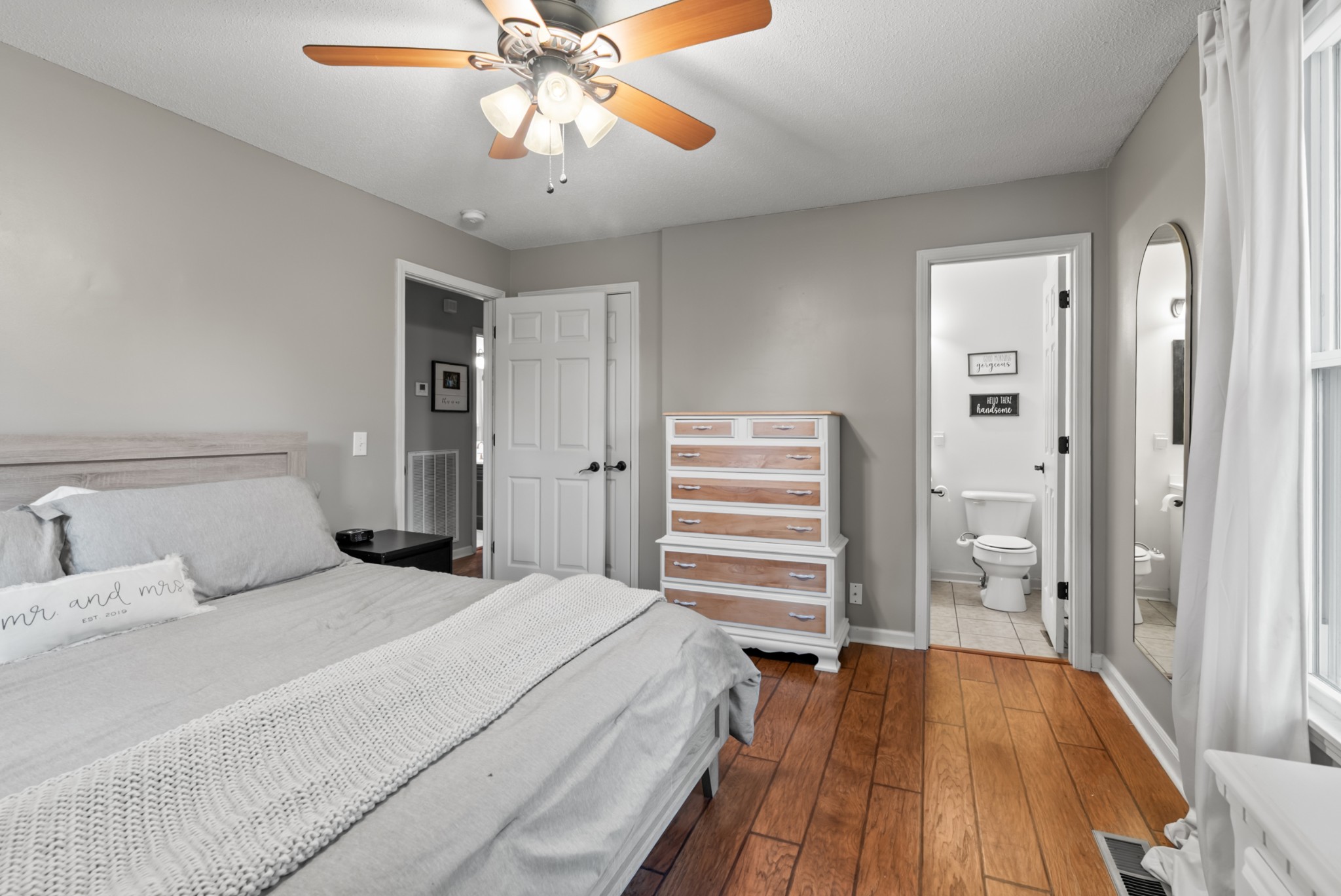 4005 Fawn Drive Springfield, TN 37172 - Photo 17 of 40 a bedroom with a bed and wooden floor