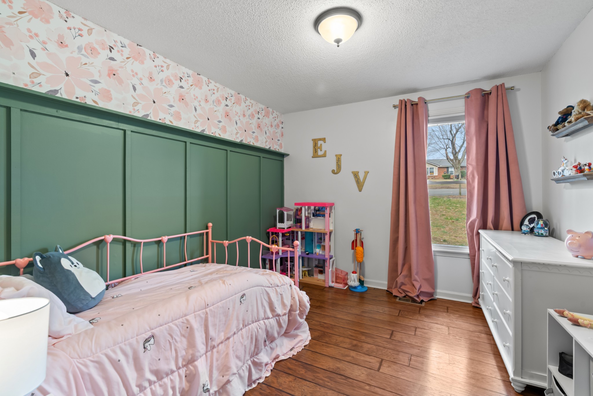 4005 Fawn Drive Springfield, TN 37172 - Photo 19 of 40 a bedroom with a bed and a flat tv screen on the dresser