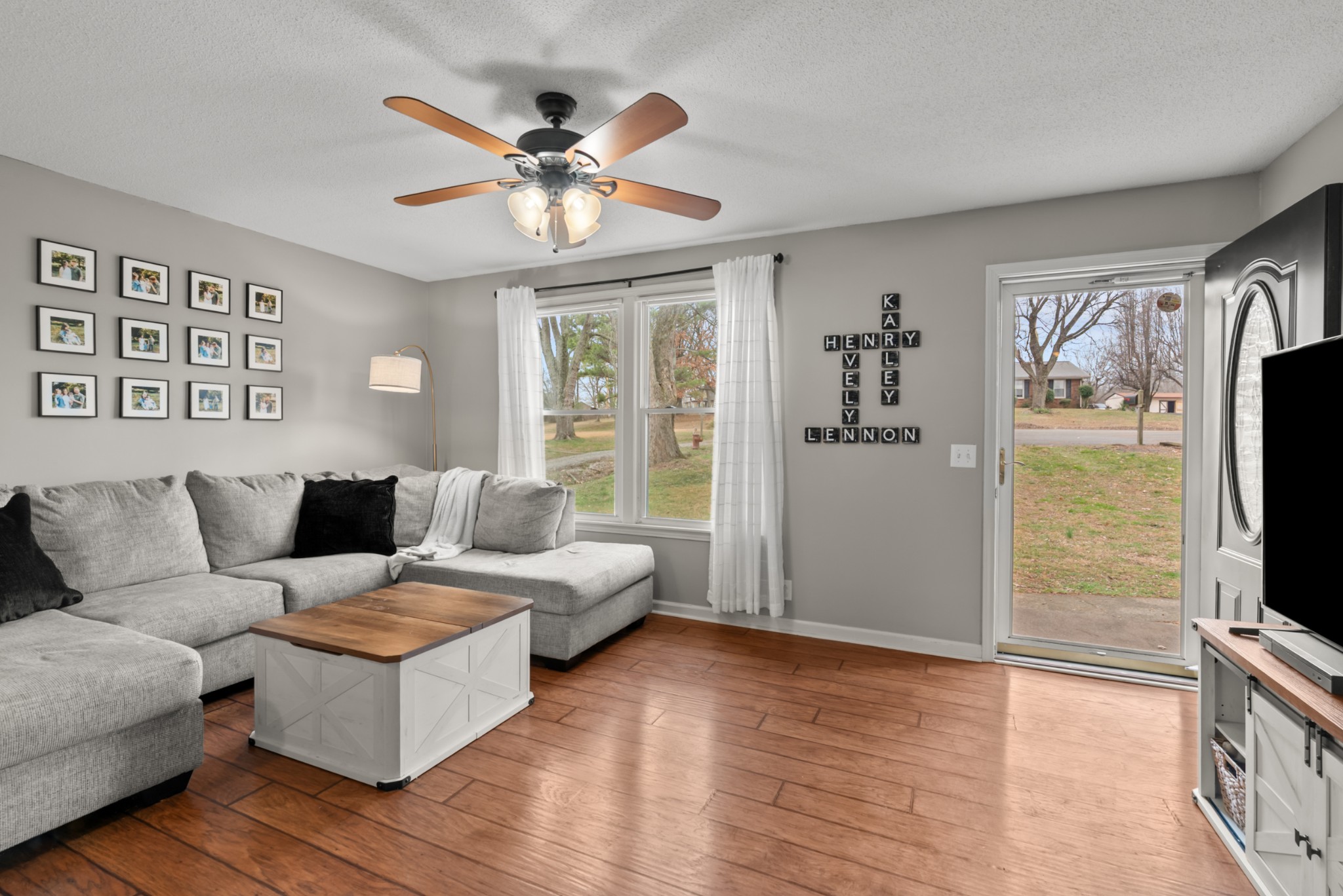 4005 Fawn Drive Springfield, TN 37172 - Photo 2 of 40 a living room with furniture and a flat screen tv